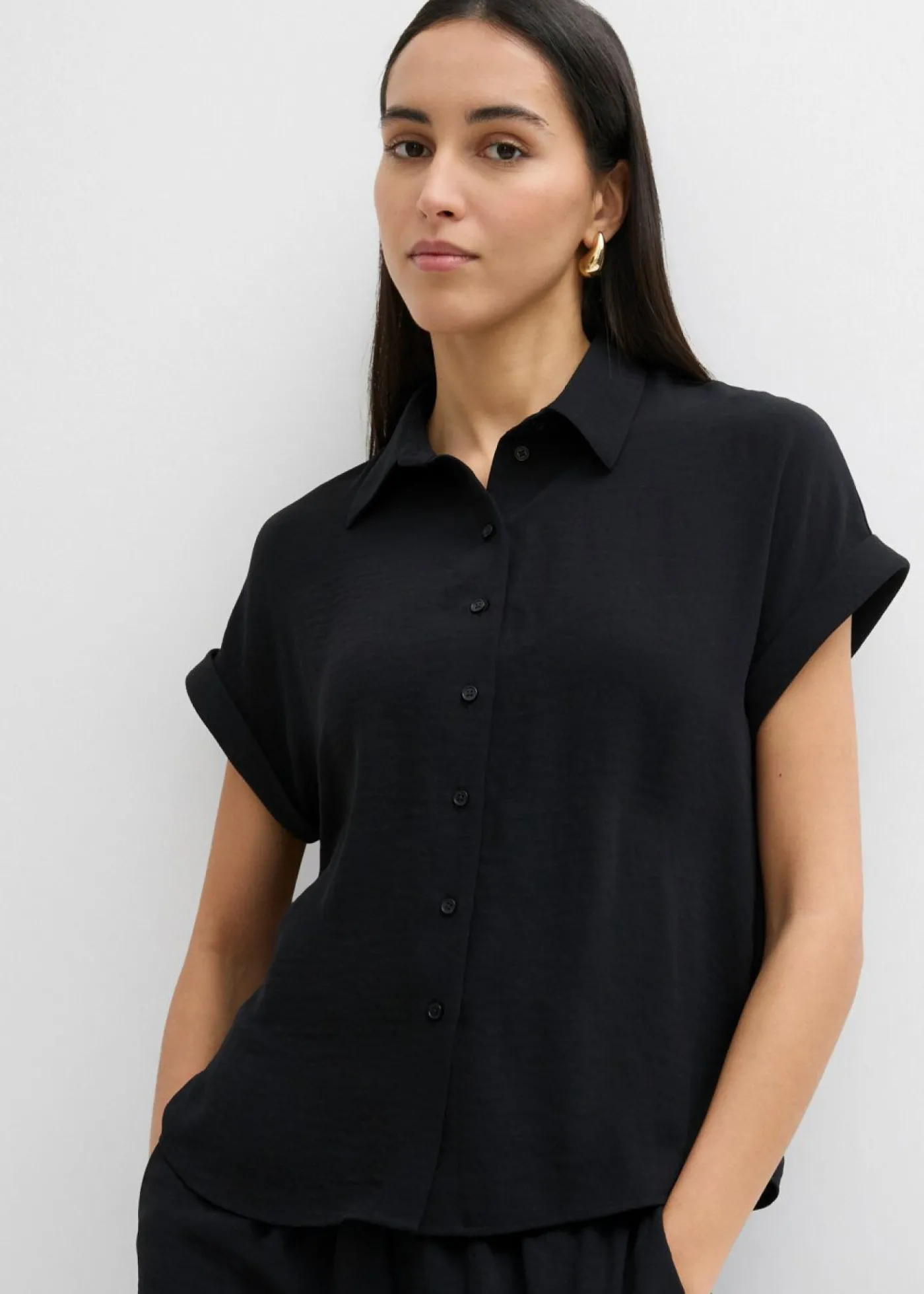bonprix bonprix Blusa holgada de crepé estructurado Negro Online