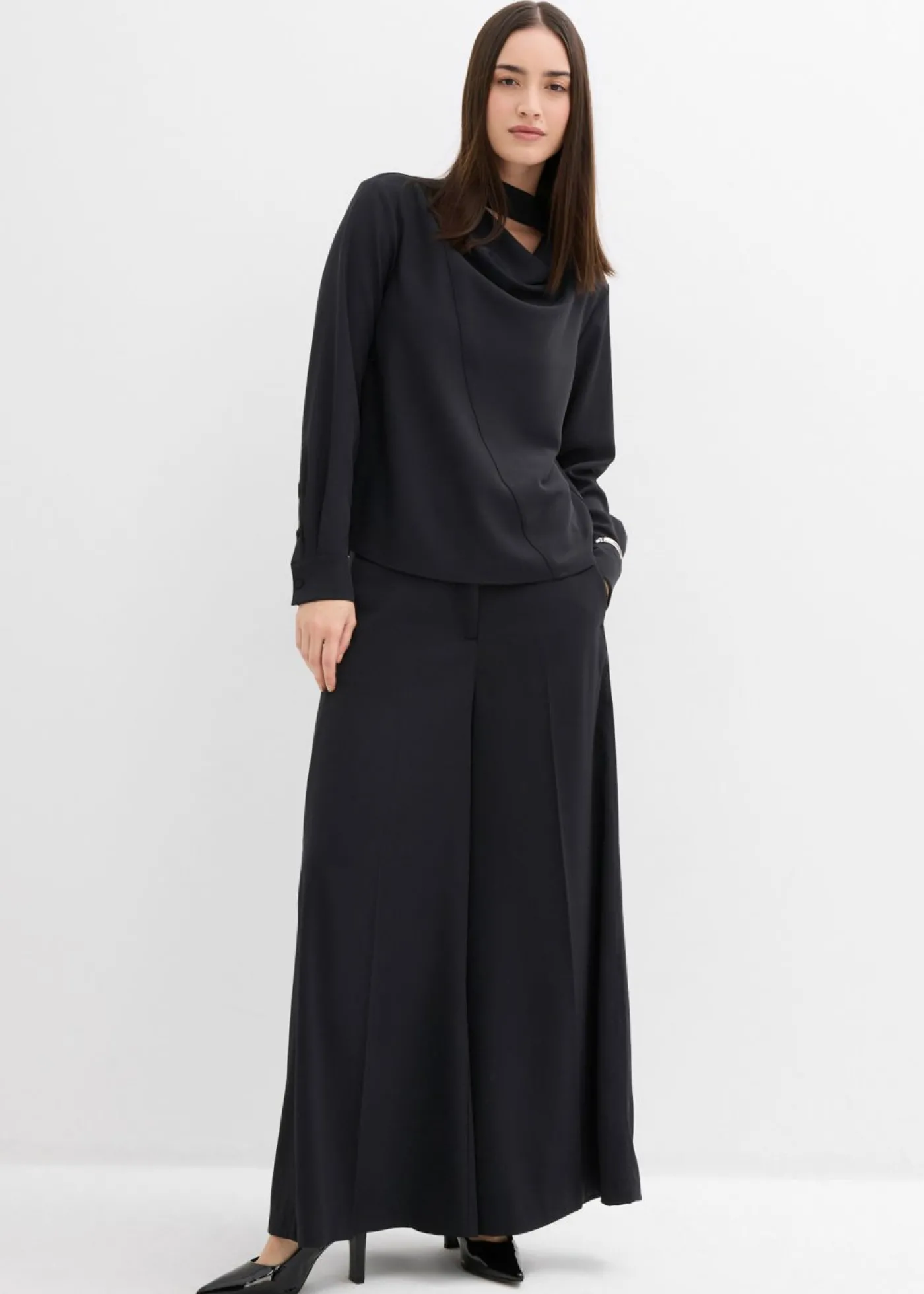 bonprix bonprix Blusa ligeramente brillante Negro Discount