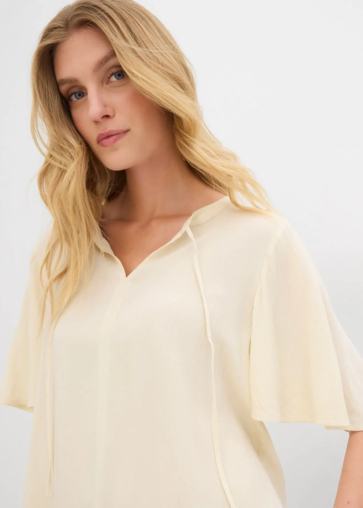 bonprix bonprix Blusa tipo túnica con mangas de murciélago Crudo Best