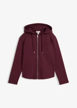 bonprix bonprix Chaqueta de chándal con capucha y poliéster reciclado rojo burdeos Hot