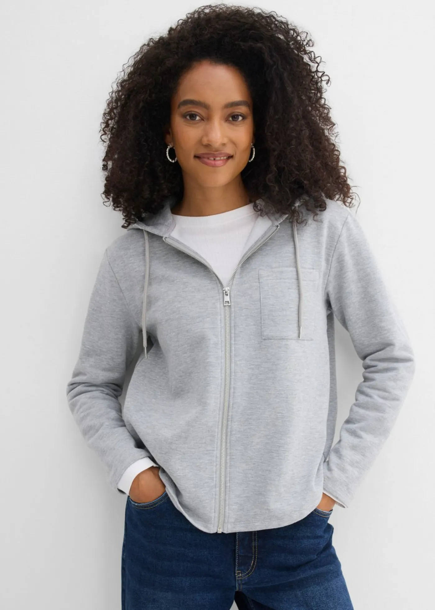 bonprix bonprix Chaqueta de chándal con capucha y poliéster reciclado Gris claro jaspeado Online