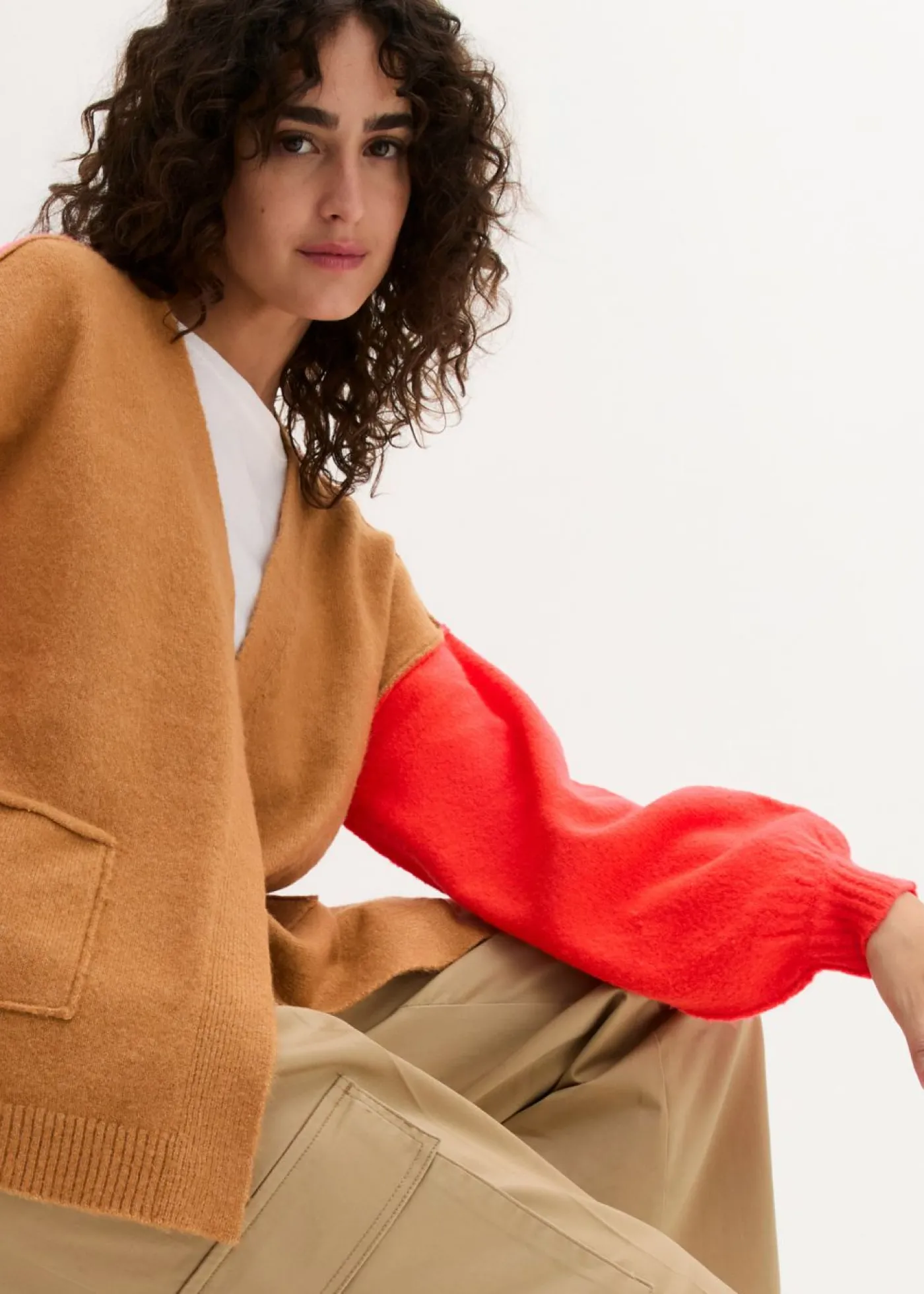 bonprix bonprix Chaqueta de punto beige crema-vnaranja neón-rosa oscuro Online