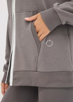 bonprix bonprix Chaqueta térmica de chándal de material de secado rápido con corte ancho Gris granito Outlet