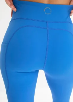 bonprix bonprix Cómodos leggings deportivos con bolsillo para móvil, corte acampanado y material de secado rápido azul horizonte Outlet