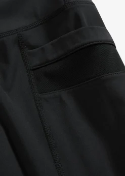 bonprix bonprix Cómodos leggings deportivos con malla y bolsillo para móvil Negro Online