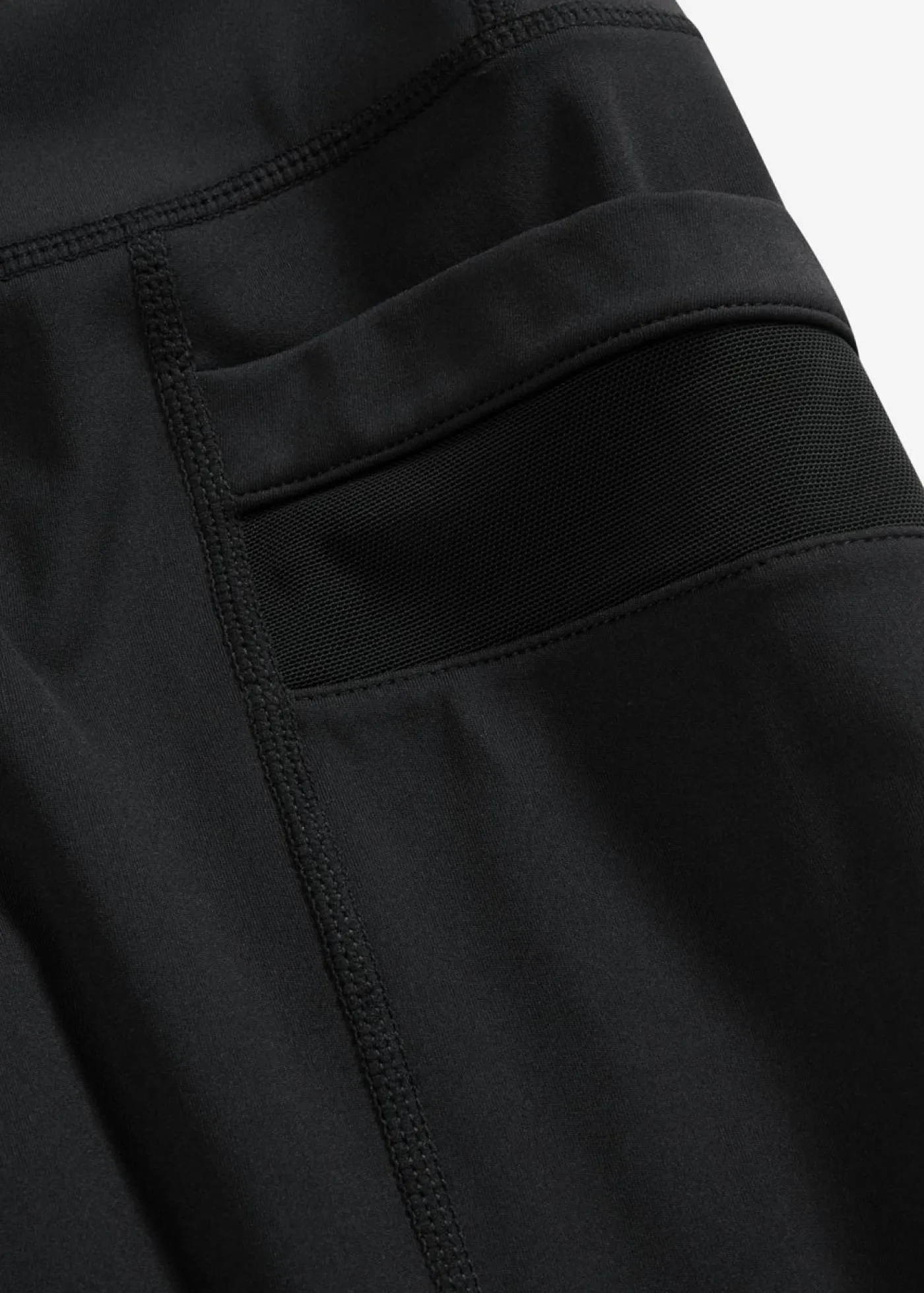 bonprix bonprix Cómodos leggings deportivos con malla y bolsillo para móvil Negro Online