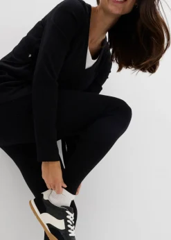 bonprix bonprix Conjunto de camiseta cruzada premamá con cómodos leggings (2 piezas) Negro Hot