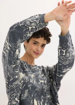 bonprix bonprix Jersey con mangas tipo murciélago y estampado de serpiente Negro + blanco perla Online