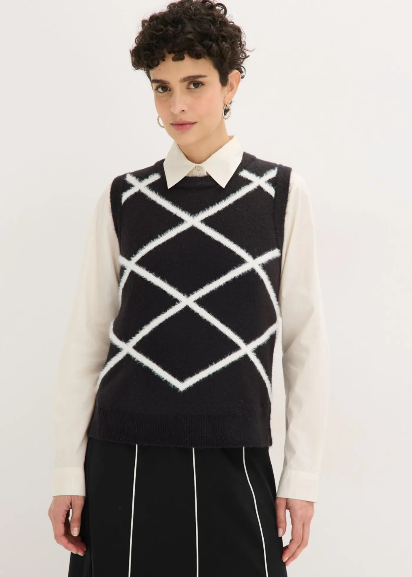 bonprix bonprix Jersey sin mangas de hilo suave Negro-blanco lana Online