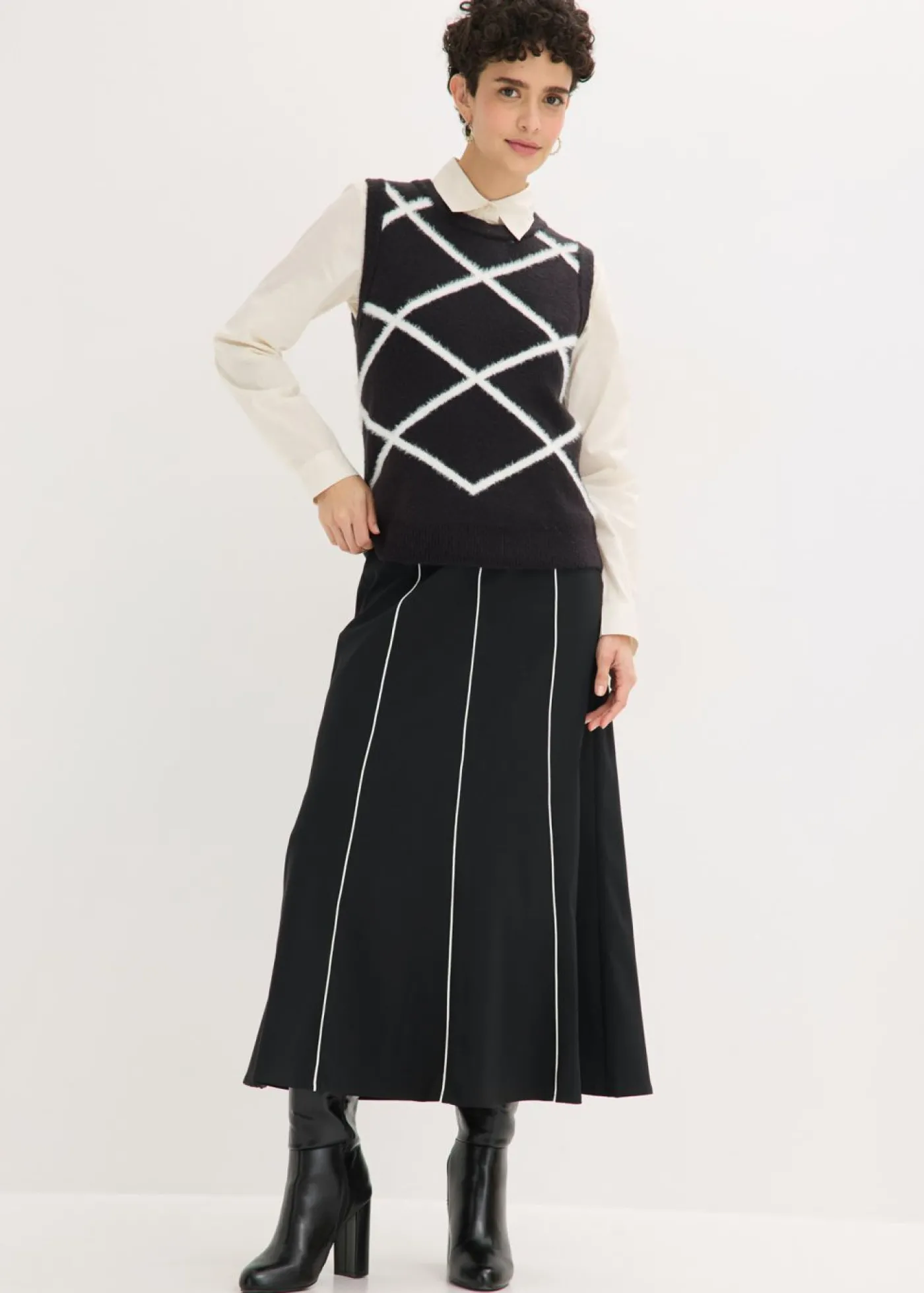 bonprix bonprix Jersey sin mangas de hilo suave Negro-blanco lana Online