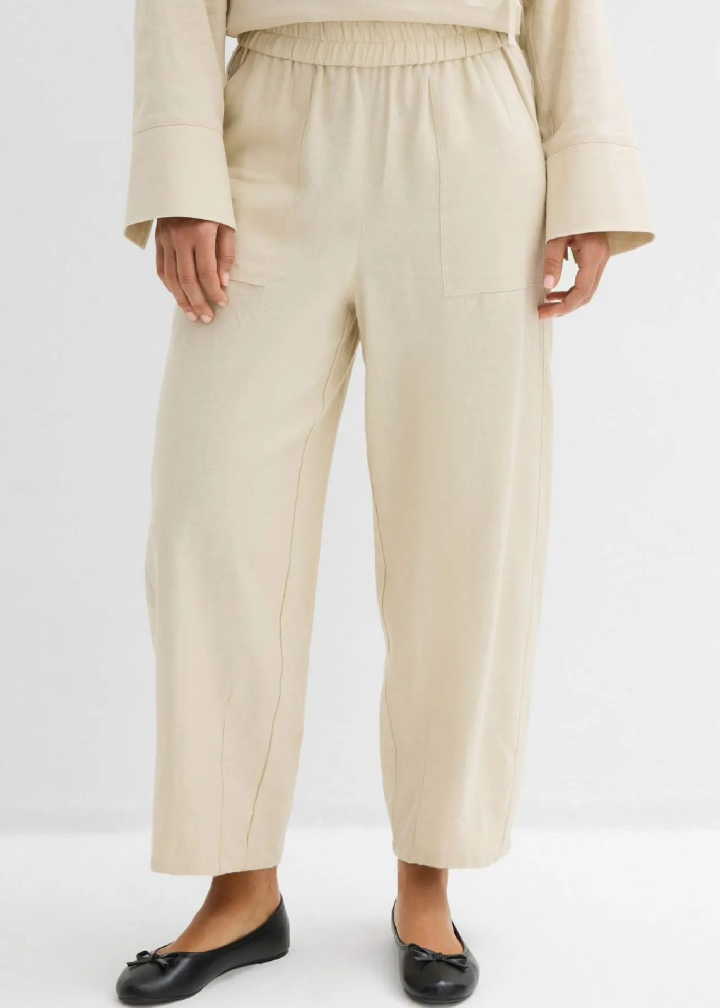 bonprix bonprix Pantalón acampanado de mezcla de lino ligero Arena claro New