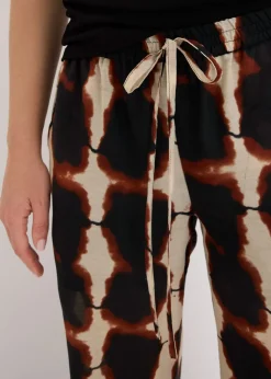 bonprix bonprix Pantalón ancho con estampado batik Negro-beige, estampado Online