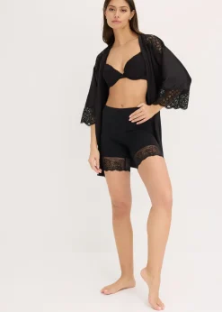 bonprix bonprix Pantalón ciclista antirrozaduras de poliamida con piernas de encaje Negro Discount