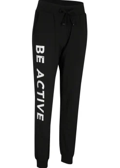 bonprix bonprix Pantalón de chándal de algodón con estampado y corte holgado Negro-blanco estampado Online