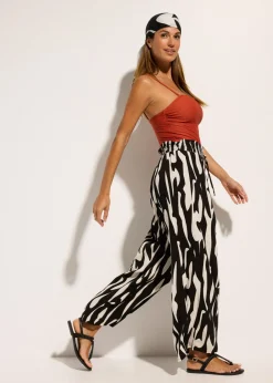 bonprix bonprix Pantalón de playa de viscosa fluida Caqui/negro con estampado gráfico Online