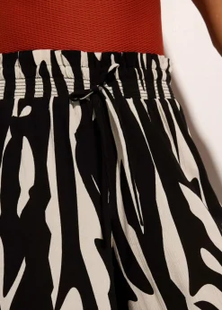 bonprix bonprix Pantalón de playa de viscosa fluida Caqui/negro con estampado gráfico Online