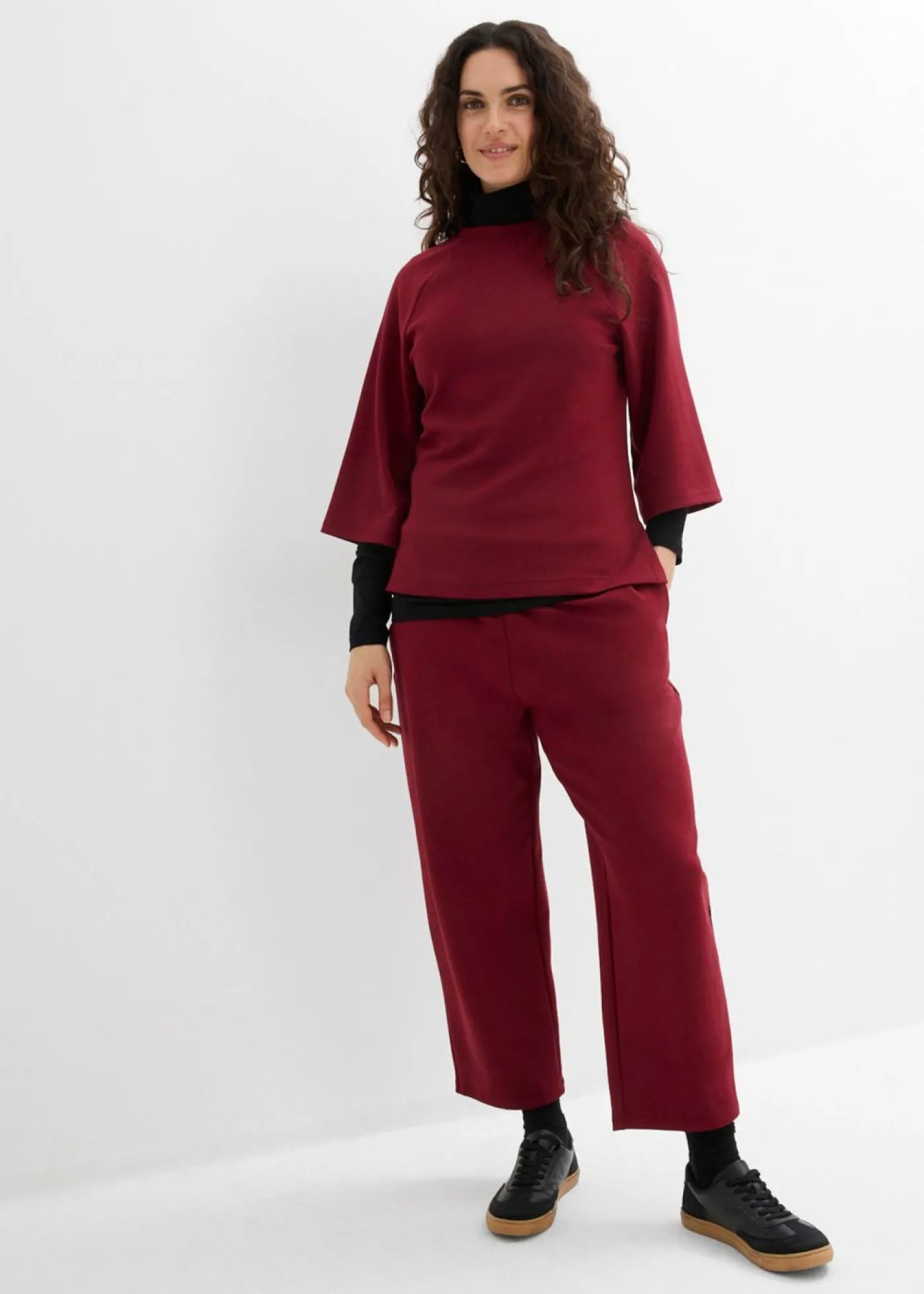 bonprix bonprix Pantalón de punto de neopreno con corte barrel Rojo rubí Best