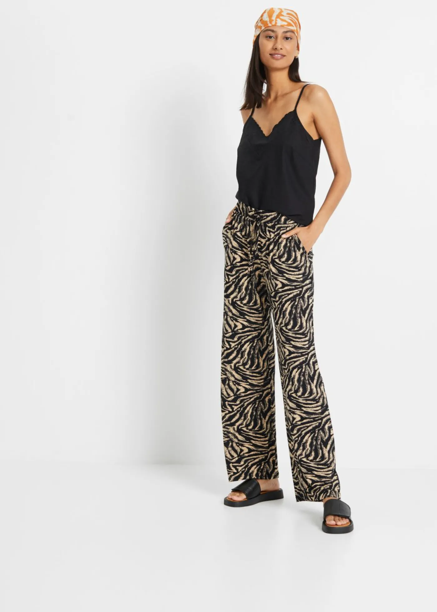 bonprix bonprix Pantalón de punto de viscosa fluida estampado cebra negro/café con leche Discount
