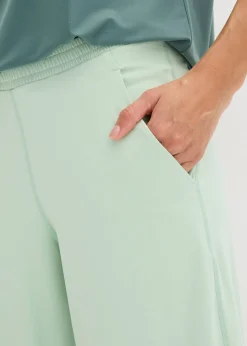 bonprix bonprix Pantalón deportivo con pernera ancha y material de secado rápido Verde pastel Best