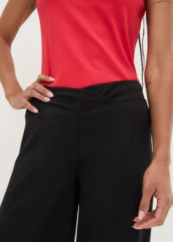 bonprix bonprix Pantalón deportivo hasta la pantorrilla de material de secado rápido Negro Sale