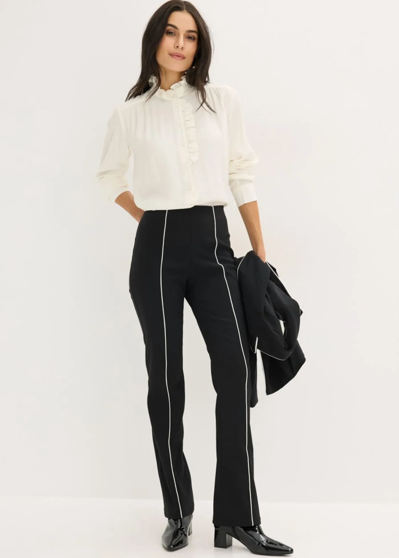 bonprix bonprix Pantalón elástico acampanado de bengalina Negro-blanco lana Outlet