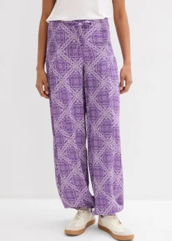 bonprix bonprix Pantalón sin cierre de viscosa fluida Lila oscuro-morado mate con estampado gráfico Hot
