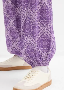 bonprix bonprix Pantalón sin cierre de viscosa fluida Lila oscuro-morado mate con estampado gráfico Hot