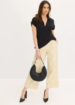 bonprix bonprix Polo de piqué de viscosa con inserto de encaje Negro Online
