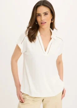 bonprix bonprix Polo de piqué de viscosa con inserto de encaje Blanco lana Online