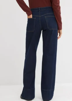 bonprix bonprix Vaqueros de talle medio de algodón orgánico con perneras anchas Azul oscuro denim Sale