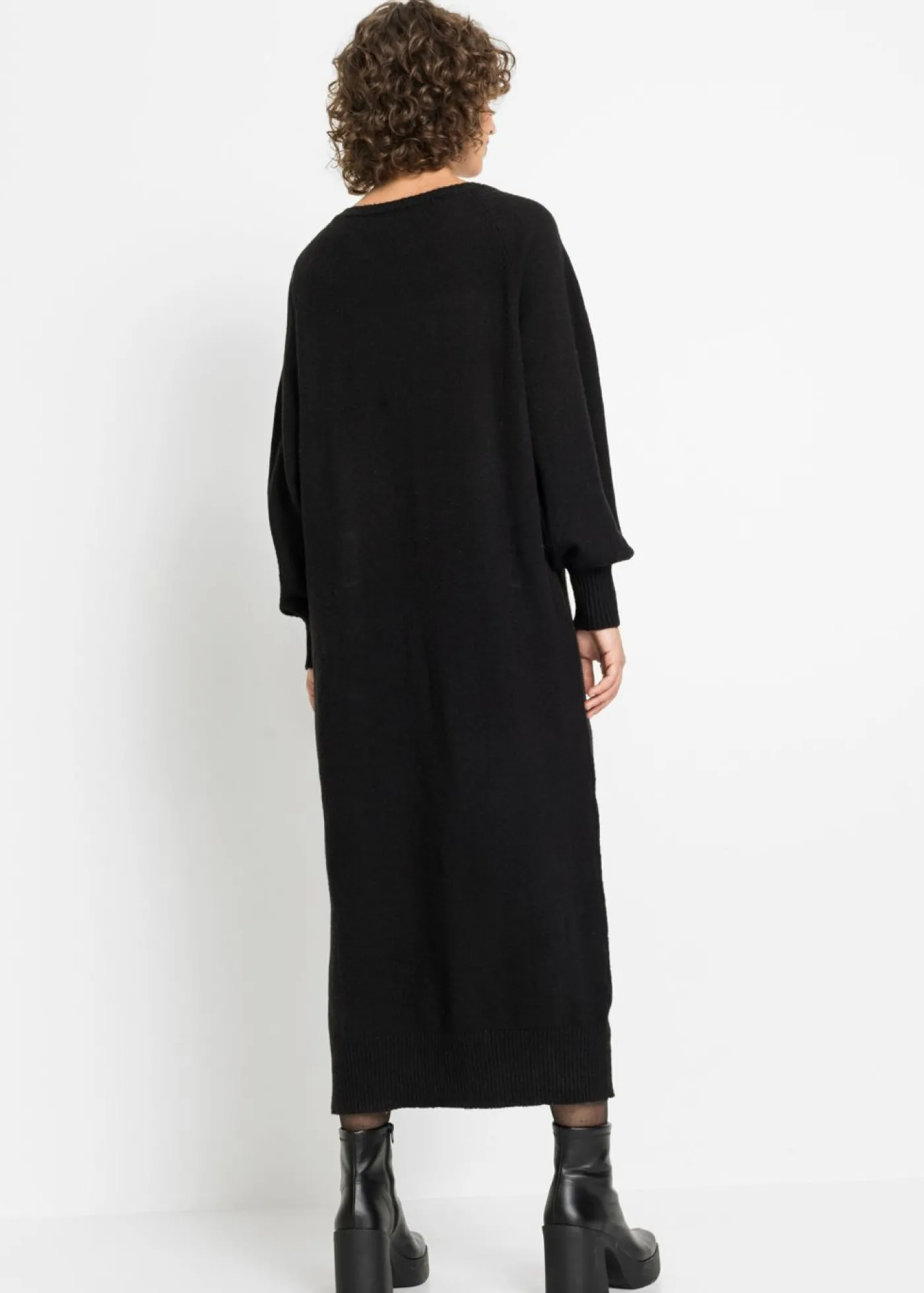 bonprix bonprix Vestido holgado de punto con largo midi Negro Online